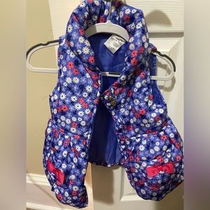 Pink and blue puffer vest